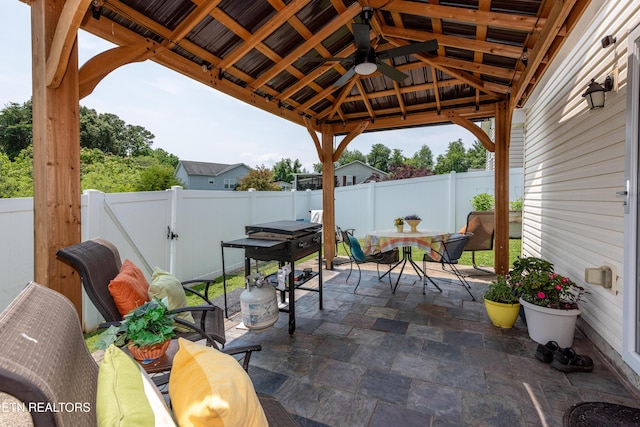 2544 Bay Meadows Way, Sevierville, TN 37876 - fenced backyard featuring a gazebo, outdoor dining space, and a patio