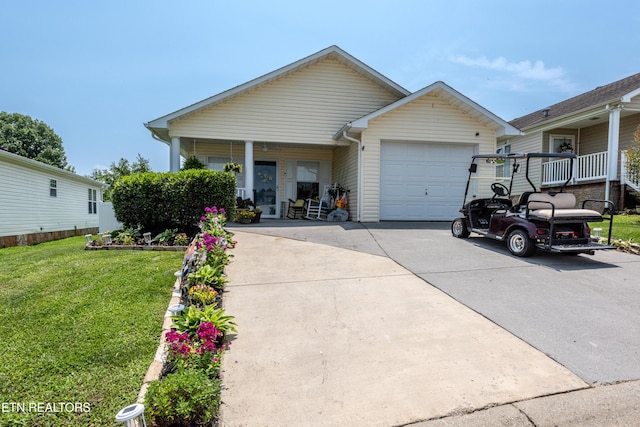 2544 Bay Meadows Way, Sevierville, TN 37876 - view of front of home featuring an attached garage, a porch, driveway, and a front yard
