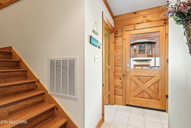 152 Eagle Crst, Tazewell, TN 37879 - foyer with wood walls, stairway, and tile patterned floors