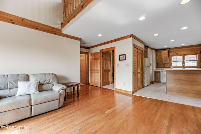 152 Eagle Crst, Tazewell, TN 37879 - living room featuring light wood-style flooring and recessed lighting