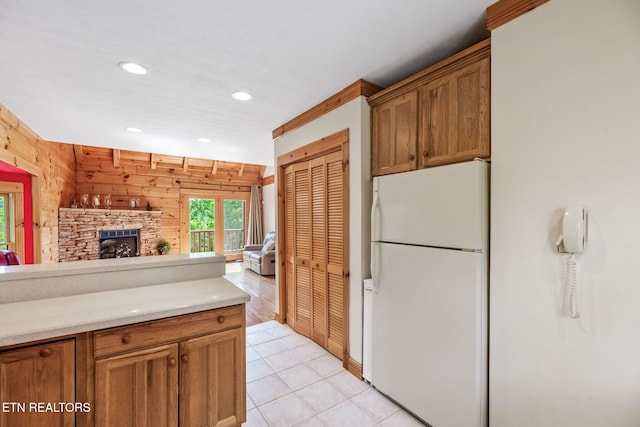 152 Eagle Crst, Tazewell, TN 37879 - kitchen featuring freestanding refrigerator, open floor plan, recessed lighting, light countertops, and wooden walls