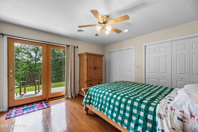 152 Eagle Crst, Tazewell, TN 37879 - bedroom with access to outside, two closets, wood finished floors, and a ceiling fan