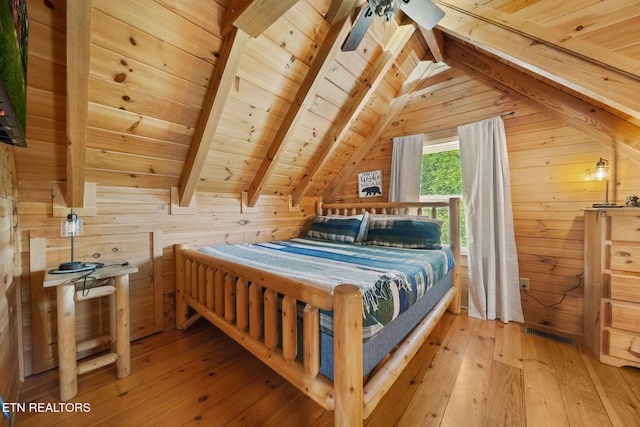 3319 Covered Bridge Way, Sevierville, TN 37862 - bedroom featuring wood ceiling, light wood-type flooring, and wood walls