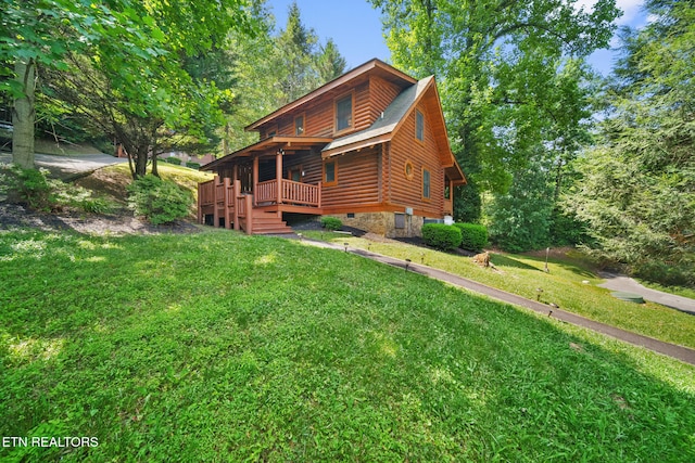 3319 Covered Bridge Way, Sevierville, TN 37862 - cabin featuring log exterior, a front yard, and crawl space