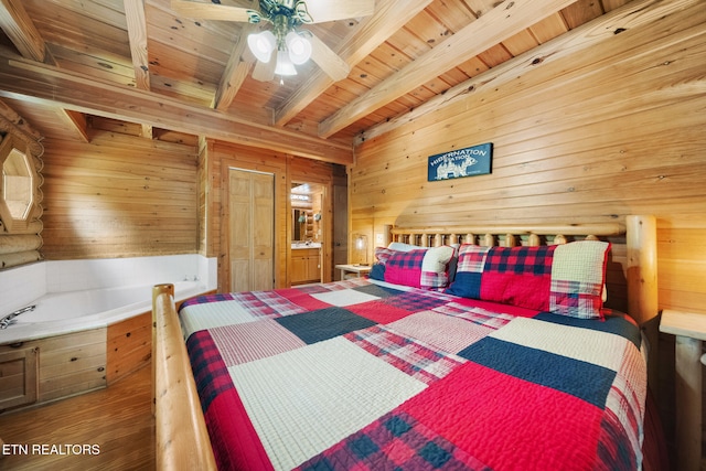3319 Covered Bridge Way, Sevierville, TN 37862 - bedroom featuring wood walls, a wood ceiling with exposed beams, wood finished floors, and ceiling fan