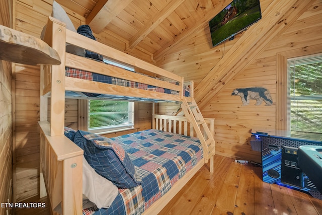 3319 Covered Bridge Way, Sevierville, TN 37862 - bedroom featuring wood walls, wood-type flooring, and wooden ceiling