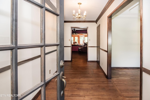 146 Lake Hills Dr, Oak Ridge, TN 37830 - corridor featuring a chandelier, ornamental molding, and dark wood finished floors