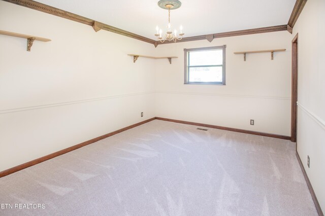 146 Lake Hills Dr, Oak Ridge, TN 37830 - carpeted spare room featuring a chandelier and crown molding