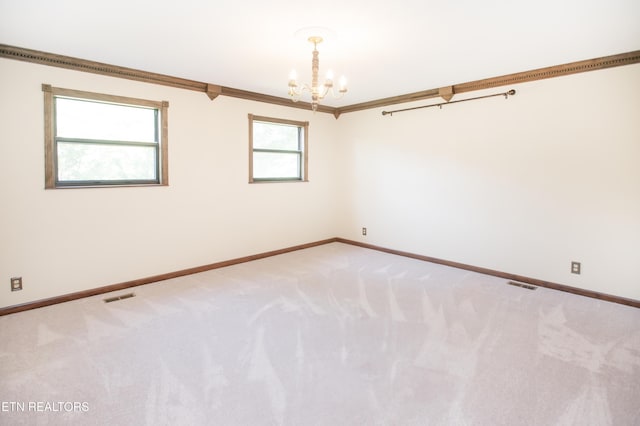 146 Lake Hills Dr, Oak Ridge, TN 37830 - carpeted spare room featuring a chandelier and baseboards