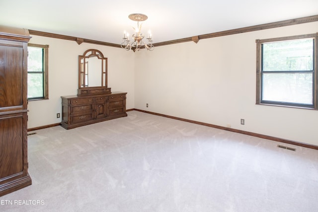 146 Lake Hills Dr, Oak Ridge, TN 37830 - empty room with a chandelier, crown molding, and light carpet