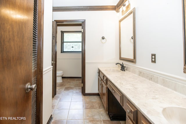 146 Lake Hills Dr, Oak Ridge, TN 37830 - bathroom featuring double vanity and a wainscoted wall