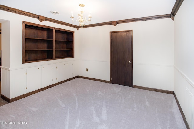 146 Lake Hills Dr, Oak Ridge, TN 37830 - carpeted spare room with a chandelier, wainscoting, and crown molding