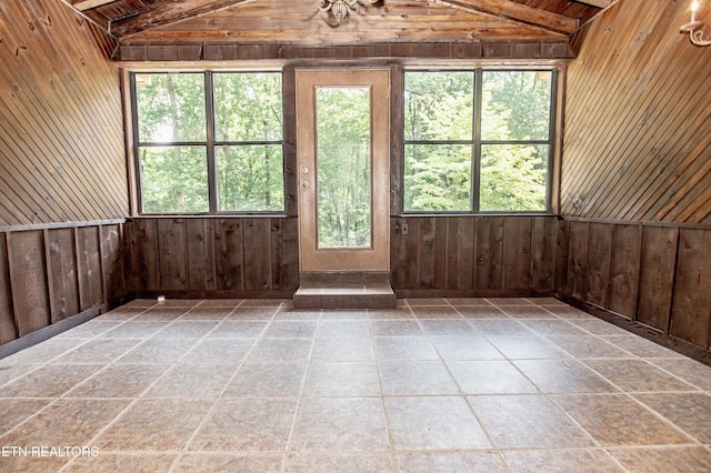 146 Lake Hills Dr, Oak Ridge, TN 37830 - spare room with wood walls and stone finish floors