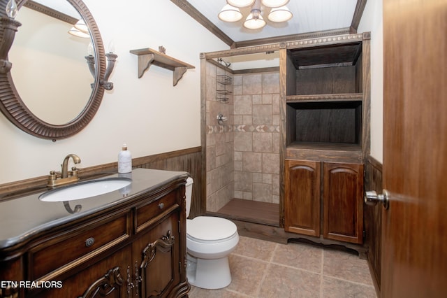 146 Lake Hills Dr, Oak Ridge, TN 37830 - full bath featuring ornamental molding, tiled shower, vanity, a wainscoted wall, and tile patterned flooring