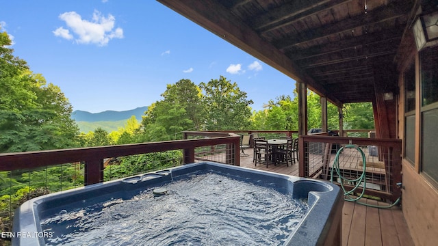 1516 Zurich Rd, Gatlinburg, TN 37738 - wooden deck with a hot tub, a mountain view, and outdoor dining area