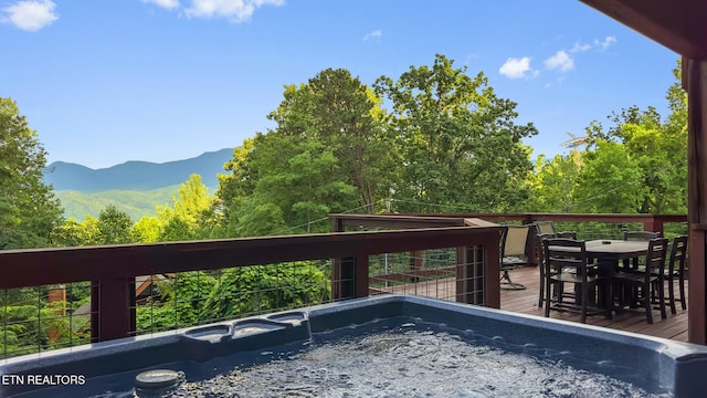 1516 Zurich Rd, Gatlinburg, TN 37738 - deck with a hot tub, a mountain view, and outdoor dining area