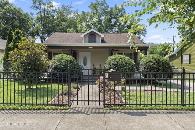 1132 Connecticut Ave, Knoxville, TN 37921 - view of front facade with a fenced front yard, a porch, a gate, and a shingled roof