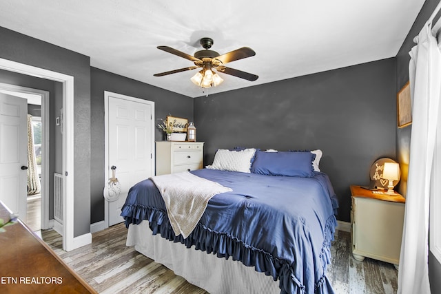 155 Kay Springs Cir, Jacksboro, TN 37757 - bedroom with wood finished floors and a ceiling fan