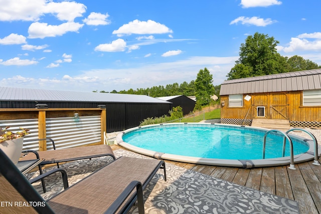 155 Kay Springs Cir, Jacksboro, TN 37757 - swimming pool with an outbuilding and a deck