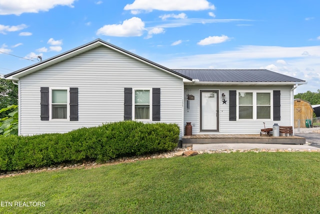 155 Kay Springs Cir, Jacksboro, TN 37757 - single story home featuring a front yard, a metal roof, and covered porch