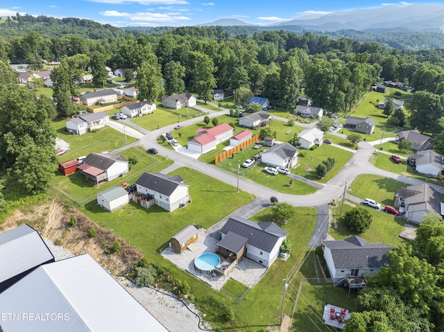 155 Kay Springs Cir, Jacksboro, TN 37757 - aerial perspective of suburban area with a heavily wooded area