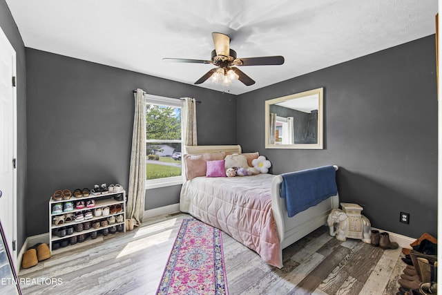 155 Kay Springs Cir, Jacksboro, TN 37757 - bedroom featuring wood finished floors and ceiling fan