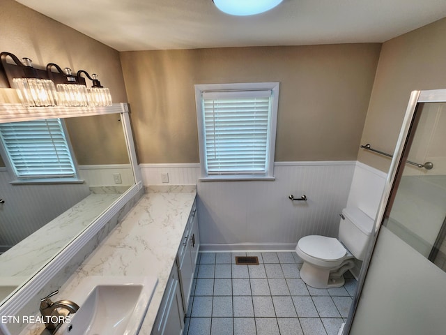 212 Ellison Rd, Lafollette, TN 37766 - bathroom with wainscoting, tile patterned floors, and vanity