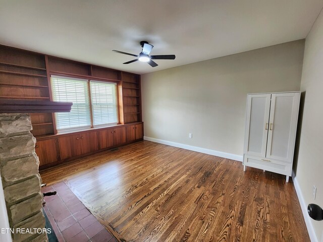 212 Ellison Rd, Lafollette, TN 37766 - spare room with wood finished floors, a ceiling fan, and built in features