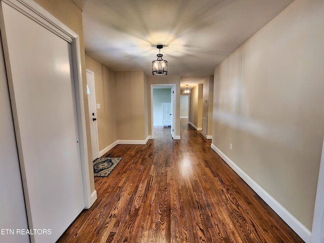 212 Ellison Rd, Lafollette, TN 37766 - hall featuring dark wood-style flooring and baseboards