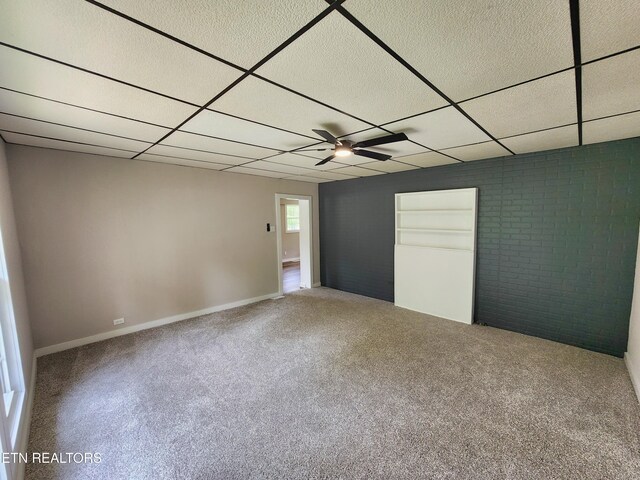 918 5th St, Jellico, TN 37762 - unfurnished bedroom with carpet and a drop ceiling