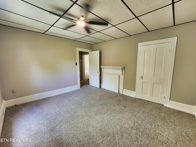 918 5th St, Jellico, TN 37762 - unfurnished bedroom featuring a paneled ceiling and carpet flooring