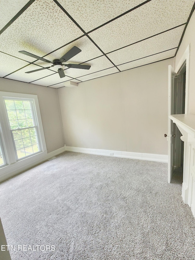 918 5th St, Jellico, TN 37762 - carpeted empty room with ceiling fan and a drop ceiling