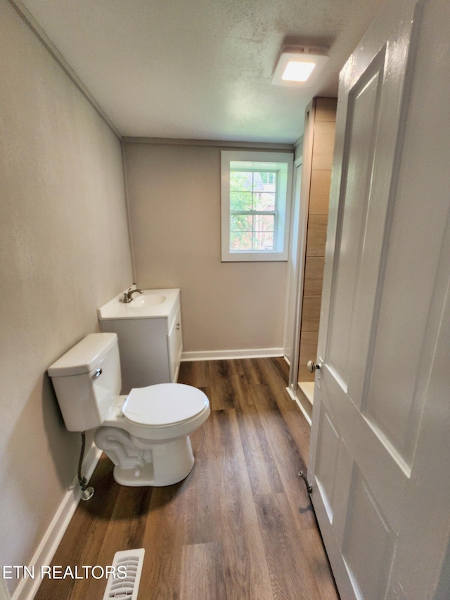 918 5th St, Jellico, TN 37762 - bathroom with wood finished floors and a textured ceiling
