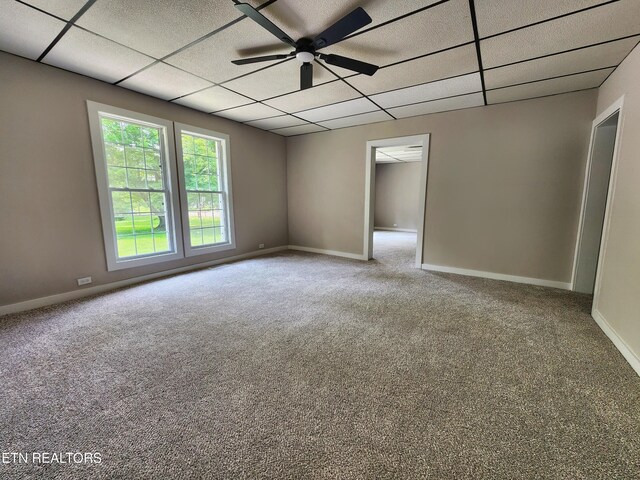 918 5th St, Jellico, TN 37762 - spare room featuring carpet flooring, a ceiling fan, and a paneled ceiling