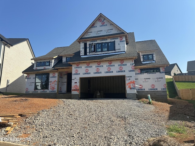 2206 Hickory Crest Ln, Knoxville, TN 37932 - property in mid-construction featuring an attached garage and gravel driveway