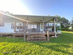 2517 Shields Ferry Rd, Morristown, TN 37814 - rear view of property with a lawn
