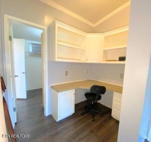 2517 Shields Ferry Rd, Morristown, TN 37814 - office space with built in desk, dark wood-style floors, and crown molding