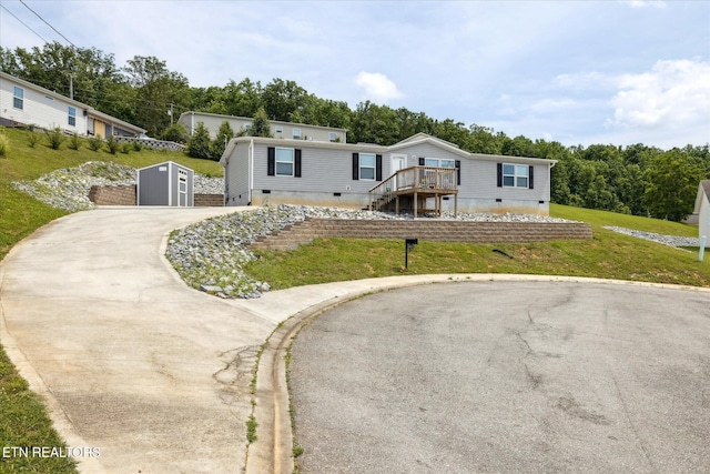 1309 Elm Village Ct, Dandridge, TN 37725 - manufactured / mobile home with crawl space, stairs, a shed, and a wooden deck