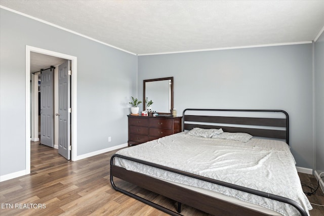1309 Elm Village Ct, Dandridge, TN 37725 - bedroom with crown molding and wood finished floors