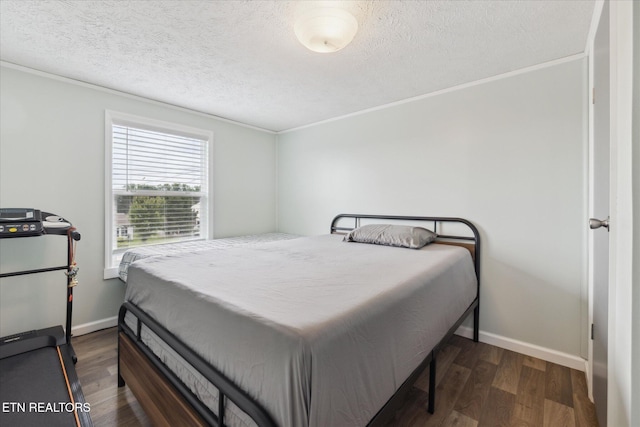 1309 Elm Village Ct, Dandridge, TN 37725 - bedroom with a textured ceiling, wood finished floors, and ornamental molding