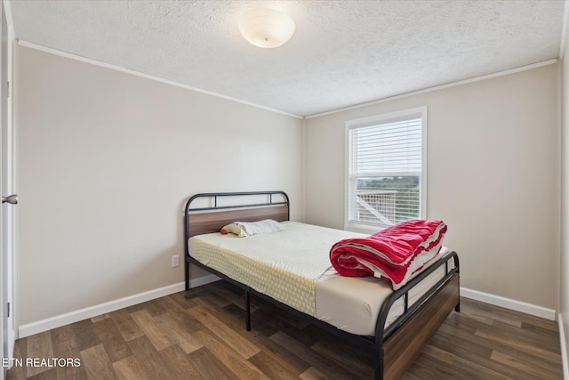 1309 Elm Village Ct, Dandridge, TN 37725 - bedroom with wood finished floors, ornamental molding, and a textured ceiling