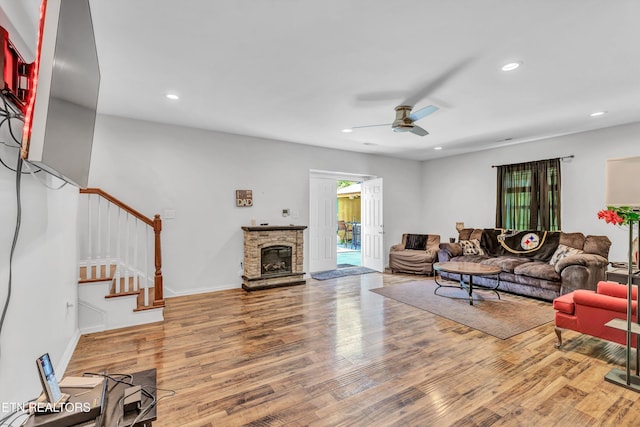 1721 N Parkridge Dr, Knoxville, TN 37924 - living room featuring ceiling fan, wood finished floors, stairs, a fireplace, and recessed lighting