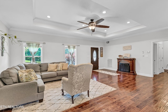 1721 N Parkridge Dr, Knoxville, TN 37924 - living area featuring a tray ceiling, light wood-style floors, ceiling fan, ornamental molding, and recessed lighting