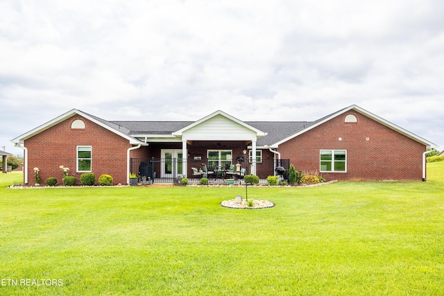1045 Southwind Cir, Dandridge, TN 37725 - back of house with brick siding, a yard, ceiling fan, and a patio area