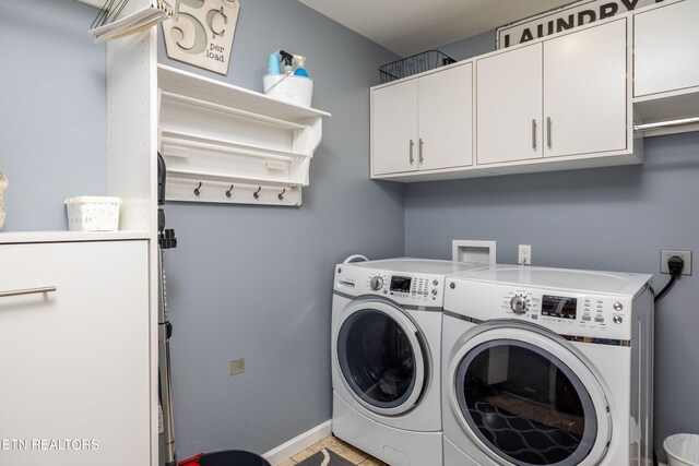 1045 Southwind Cir, Dandridge, TN 37725 - washroom featuring washing machine and clothes dryer and cabinet space