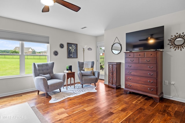 1045 Southwind Cir, Dandridge, TN 37725 - living area featuring a ceiling fan and dark wood-type flooring
