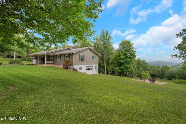 1820 Locust Grove Rd, New Tazewell, TN 37825 - view of front facade featuring an attached garage, covered porch, and a front yard