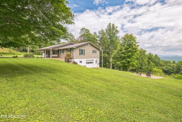 1820 Locust Grove Rd, New Tazewell, TN 37825 - rear view of property featuring a garage, a lawn, and a porch