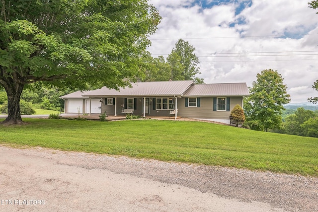1820 Locust Grove Rd, New Tazewell, TN 37825 - ranch-style house featuring covered porch, an attached garage, a front lawn, and a metal roof