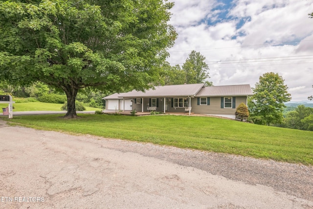 1820 Locust Grove Rd, New Tazewell, TN 37825 - ranch-style home featuring a porch, a garage, a front yard, and a metal roof